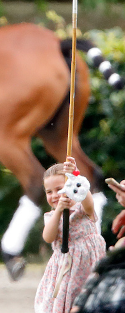 Princess Charlotte carries Ty Diamond the Unicorn Sequin Wristlet​​